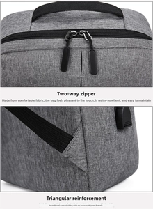 Detailed macro view of water-resistant fabric with reinforced triangular stitching and dual zippers