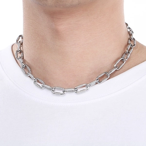 Close-up of 10mm thick stainless steel O-chain necklace worn by a model in silver finish