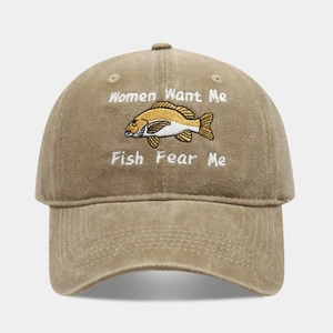 Detail of embroidered Women Want Me Fish Fear Me text on khaki washed cotton cap