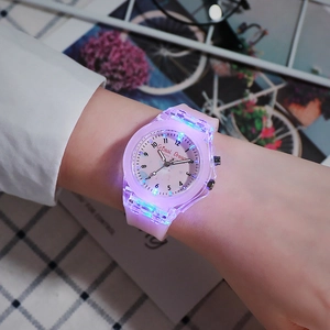 Pink LED glowing kids watch with translucent silicone strap and colorful lights