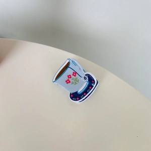 Creative coffee cup and saucer acrylic hair claw clip with blue floral design and red flowers