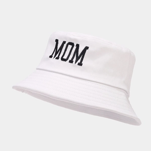 White cotton bucket hat for women with black MOM embroidery on light gray background