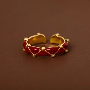 24K gold plated adjustable open ring featuring deep red enamel and diamond texture