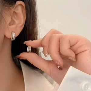 Silver hoop earrings with triple row micro-pave cubic zirconia crystals