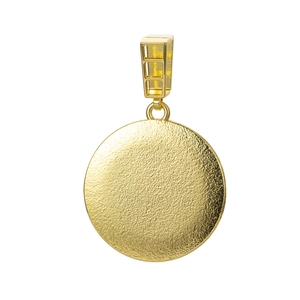 Detailed macro of gold-plated circular pendant with a textured frosted sandblasted finish