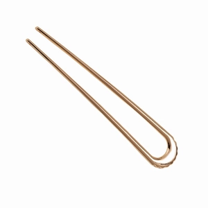 Vintage rose gold U-shaped metal hair pin with minimalist wavy design on white background