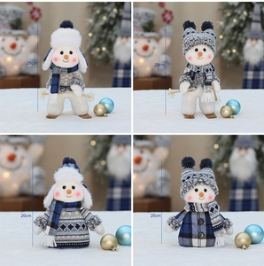 Detailed close-up showing blue plaid snowman plush ornaments in 20cm and 28cm sizes