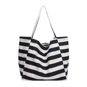 Classic blue and white striped canvas tote bag with long handles for shoulder use