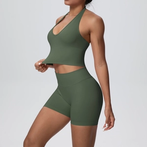 Detail view of army green seamless knitted yoga set with halter bra and high-waist shorts