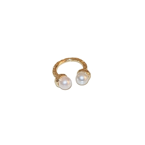 Elegant gold hammered open ring with two white pearls in a minimalist design