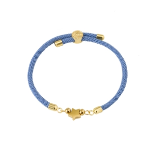 Close-up of light blue woven bracelet with engraved gold bead and matte star pendant