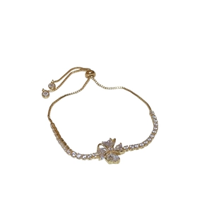Elegant gold zircon four-leaf clover bracelet with adjustable bolo slide clasp for women