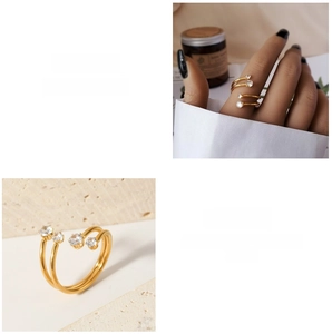 Detail of adjustable gold-plated double-layer ring with four clear zircon stones