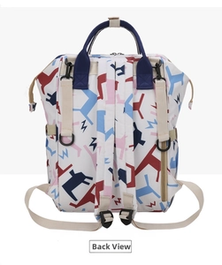 Back view of printed diaper backpack showing padded shoulder straps and anti-theft pocket