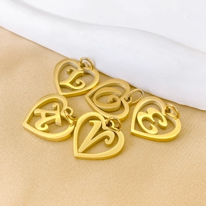 Hollow heart letter pendants in gold-plated stainless steel for DIY jewelry making.