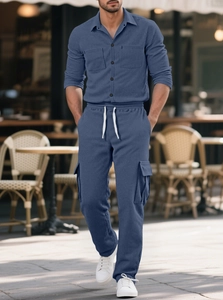 Detail of navy corduroy set showing cargo side pockets and drawstring waist texture