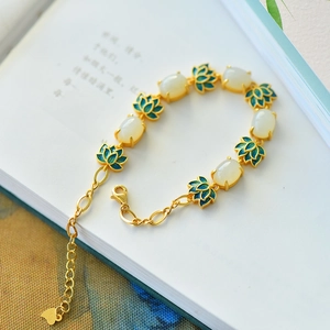 Retro S925 silver gold-plated bracelet with white jade lotus and blue enamel accents