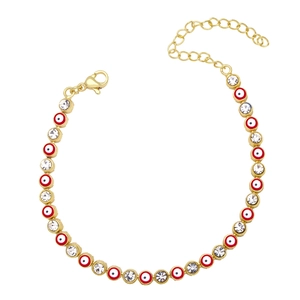 Detailed view of evil eye bracelet with red beads and sparkling zircon stones in gold
