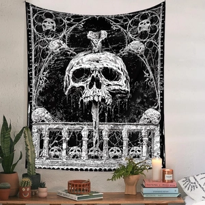 Gothic skull wall tapestry in black and white line art displayed on a white room wall