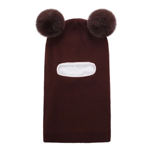 Detail of baby balaclava hat with dual pom-poms and thick white fleece lining