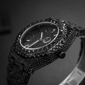 Macro view of black diamond-encrusted watch case and lugs with premium craftsmanship