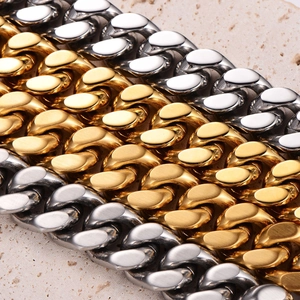 Close-up of heavy-duty cuban link bracelets in 18K gold and polished stainless steel finish