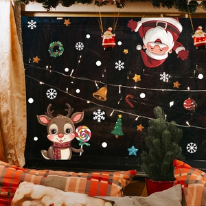 Christmas window decals with Santa, cartoon reindeer and snowflakes for home holiday decor