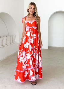 Detail of red floral maxi dress with tie shoulder straps and elegant square neckline