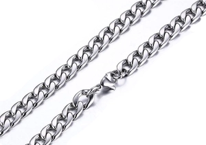 Detailed close-up of a silver cuban link chain with a heavy-duty lobster clasp