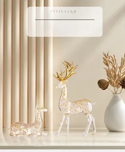 Close-up of luxury transparent gold leaf deer figurines with elegant antlers detail