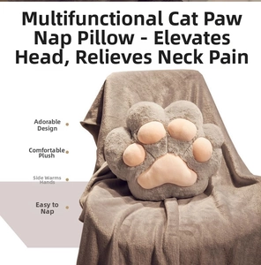 Detailed view of plush cat paw nap pillow with side hand warmer pockets in grey and pink