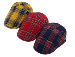Three vintage plaid newsboy caps in yellow, red, and blue with adjustable side metal buckles