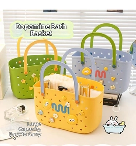 Close-up of hollow plastic bath baskets with colorful cartoon charms and handle