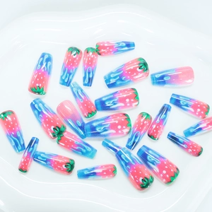 Long coffin fake nails with strawberry theme and pink-blue gradient melting effect