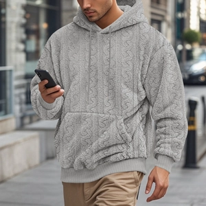 Detailed view of the thick teddy fleece texture and drawstring hood on light grey hoodie