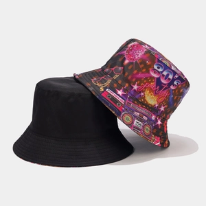 Detail view of retro 80s graffiti party bucket hat and reversible solid black hat