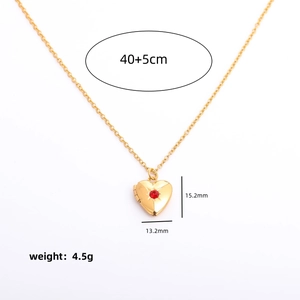 Gold heart locket necklace with red birthstone and size specs, 40+5cm chain length