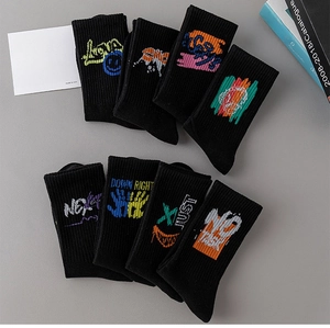 Detail of cotton crew socks featuring street style graffiti and artistic patterns