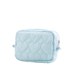 Light blue quilted heart pattern cosmetic bag with silver zipper on white background