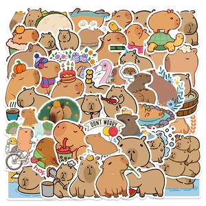 Detailed close-up of various cute cartoon capybara waterproof stickers in a vibrant pile