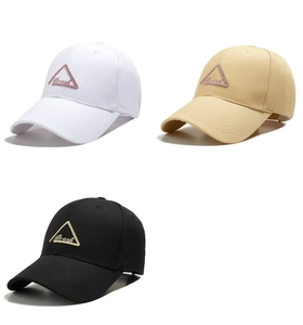 Three cotton baseball caps in white, khaki, and black with embroidered Break triangle logo