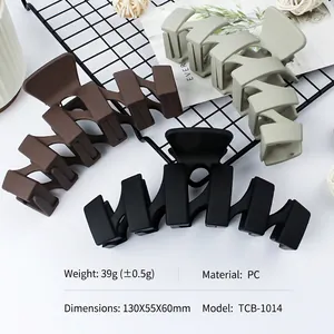 Matte wavy hair claw clips set in black brown and beige colors for elegant styling