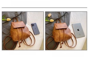 Size comparison of small brown leather backpack with iPad mini and iPhone 14 Pro
