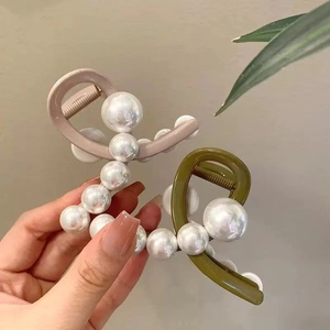 Elegant pearl hair claws in nude pink and olive green with large white imitation pearls