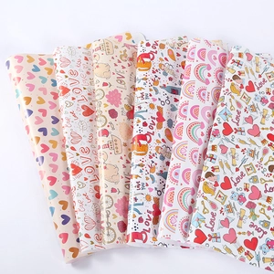 Colorful Valentine's gift wrapping paper set with romantic heart and rainbow patterns