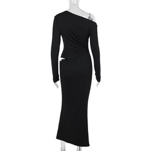 Detail view of the sleek back design with ruching on a black one-shoulder maxi dress