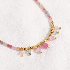 Colorful natural stone beaded necklace with gold accents and bohemian tassel pendant