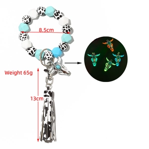 Luminous bull head silicone bead bracelet keychain with cow print beads and leather tassel