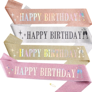 Glittering Happy Birthday sash set in rose gold, gold, silver, and pink with safety pin