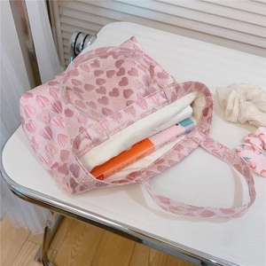 Detailed interior view of pink heart jacquard tote bag with spacious capacity for daily items